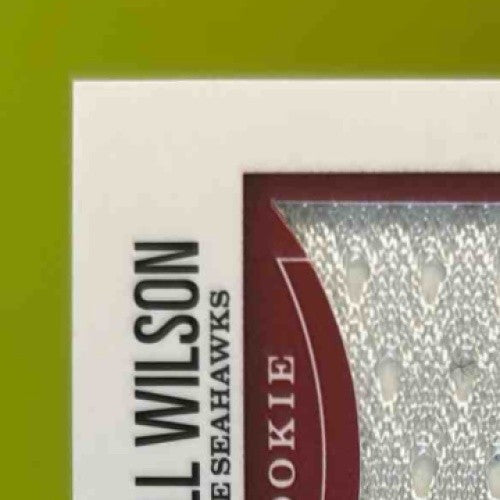 2012 Rookies & Stars Russell Wilson Crusade Materials Red 140/199 #5 RC Seahawks - Sports Cards