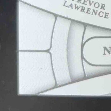 2021 National Treasures Trevor Lawrence Jones Fields NFL Gear Trio Materials /99 - Sports Cards