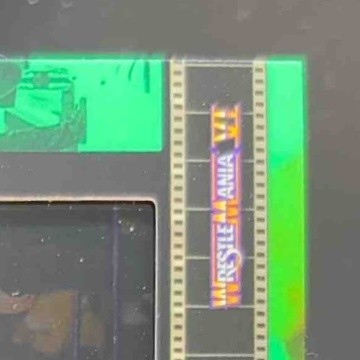 2021 Topps WWE Hulk Hogan vs. Ultimate Warrior Match Film Strips Light Green/199 - Sports Cards