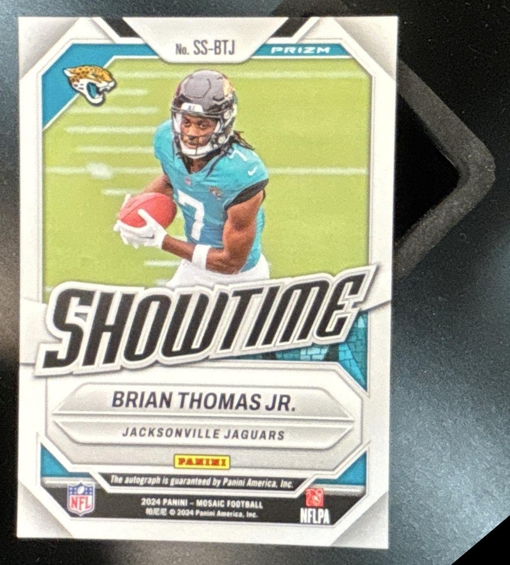 2024 Mosaic Brian Thomas Jr. Showtime Signatures Red and Yellow RC Auto Jaguars - Sports Cards