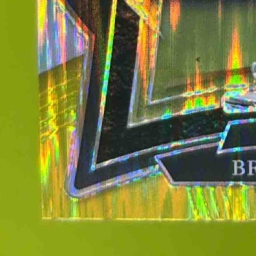 2024 Panini Select Brock Bowers Green and Yellow Prizm Shock #31 RC Raiders - Sports Cards