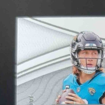 2021 National Treasures Trevor Lawrence Jones Fields NFL Gear Trio Materials /99