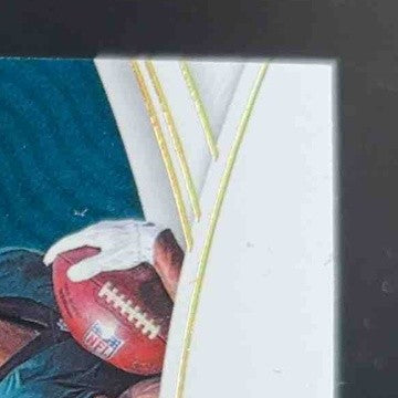 2021 National Treasures DeVonta Smith Rookie NFL Gear Combo Materials Gold 1/10