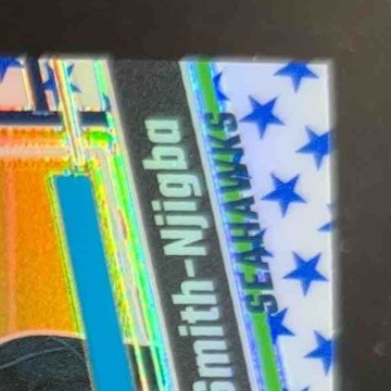 2023 Donruss Optic Jaxon Smith-Njigba Blue Stars Prizm 293 Rated Rookie Seahawks