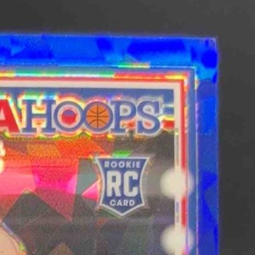 2023-24 Hoops Premium Stock Brandin Podziemski Rising Stars Blue Ice Prizm/99 RC