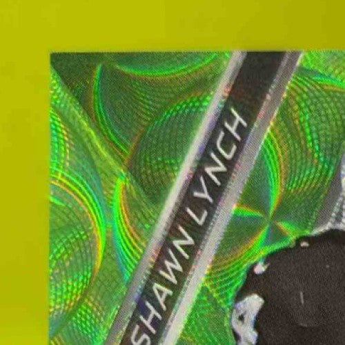 2018 Panini Spectra Marshawn Lynch Neon Green 12/30 #83 Seattle Seahawks - Sports Cards