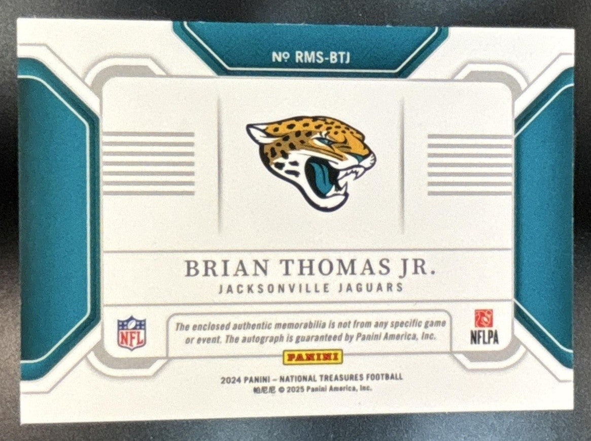 2024 National Treasures Brian Thomas Jr. Material Signatures RPS /99 Auto - Sports Cards