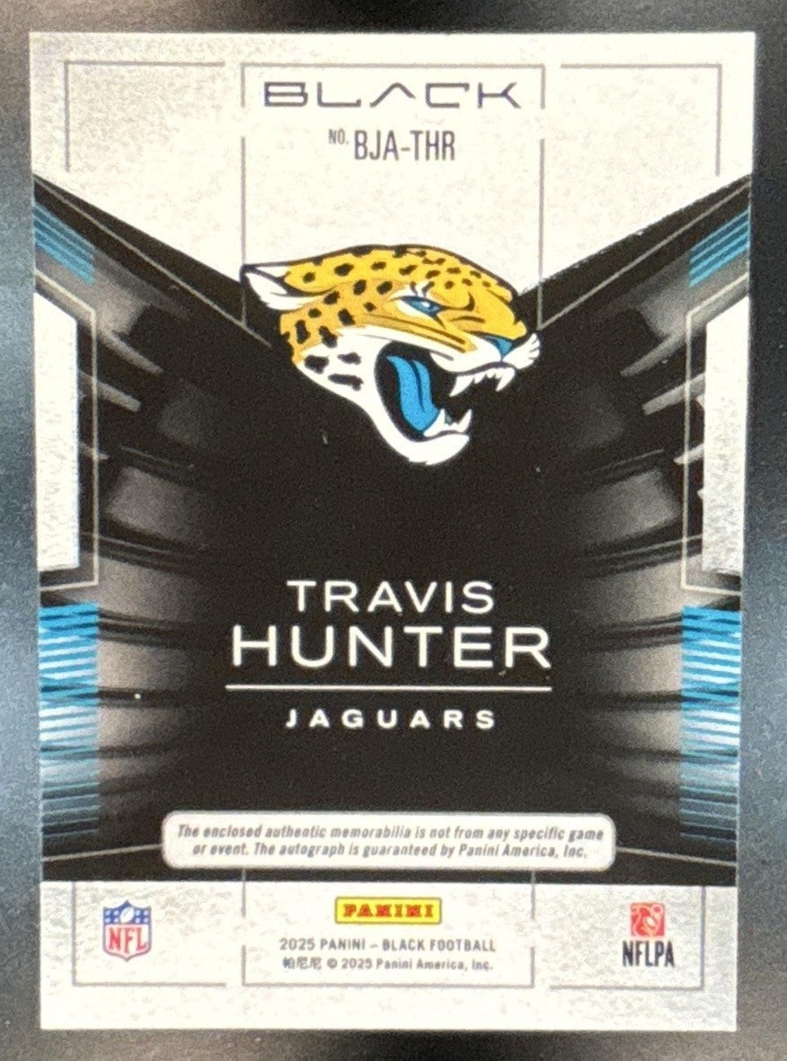 2025 Panini Black Travis Hunter Blacked Out Auto /25 MEM RC Jacksonville Jaguars - Sports Cards