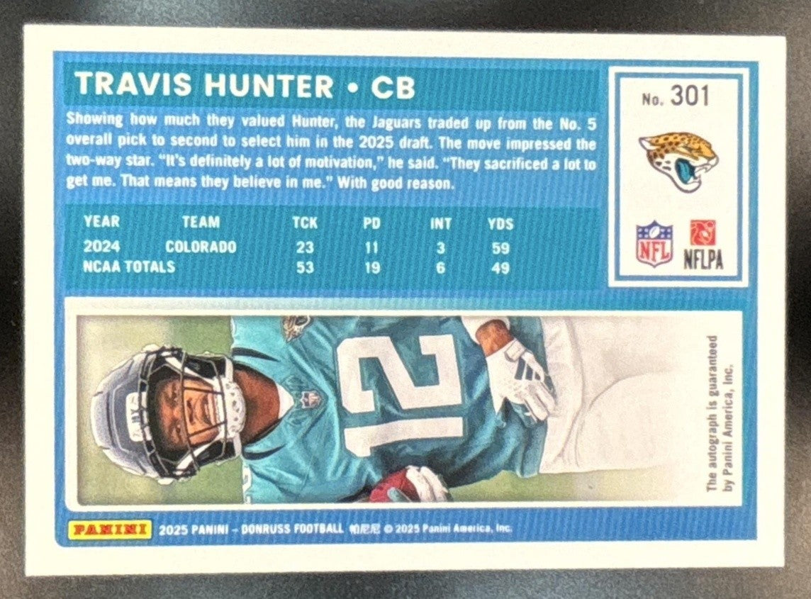 2025 Panini Donruss Travis Hunter Auto Orange #301 RC Jacksonville Jaguars - Sports Cards