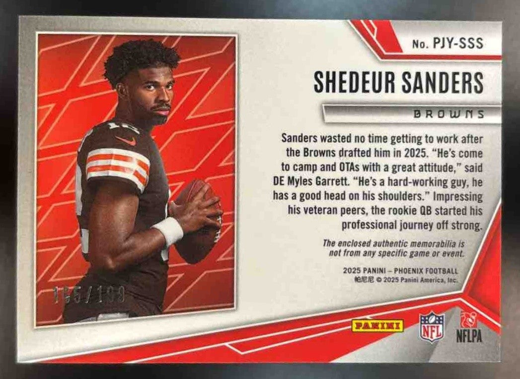 2025 Phoenix Shedeur Sanders Patch Blue /199 #13 RC Browns - Sports Cards