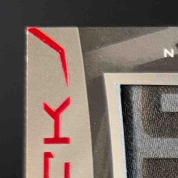 2024 Panini Black Jordan Travis Rookie Signature Material Ruby /15 RC Auto