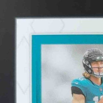 2021 Panini Phoenix Trevor Lawrence Rising Rookie Material Signature Hat 1/10 AU