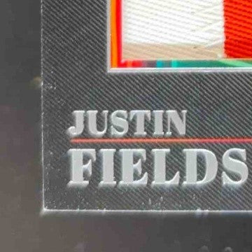 2023 Panini Plates & Patches Justin Fields Swag Champ /75 MEM Chicago Bears
