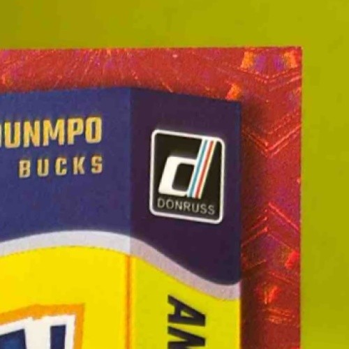 2024-25 Panini Donruss Giannis Antetokounmpo Crunch Time Red /55 #12 Bucks