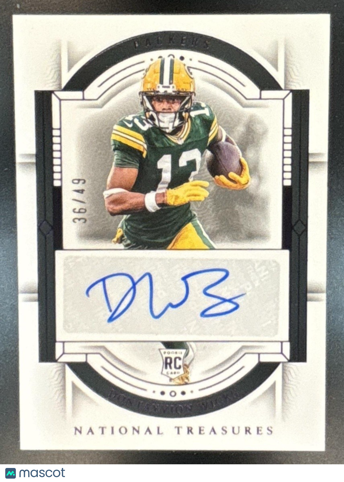 2023 National Treasures Dontayvion Wicks Purple /49 Auto RC Green Bay Packers