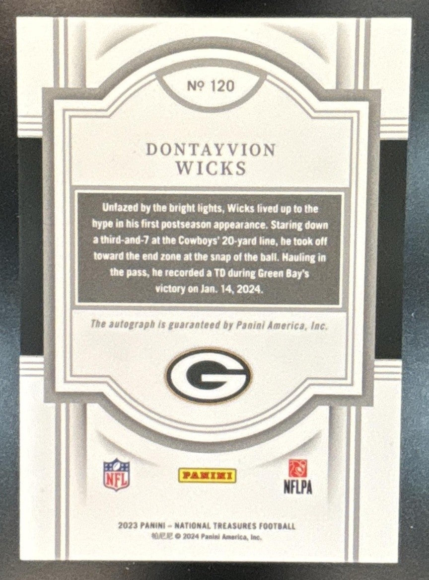 2023 National Treasures Dontayvion Wicks Purple /49 Auto RC Green Bay Packers