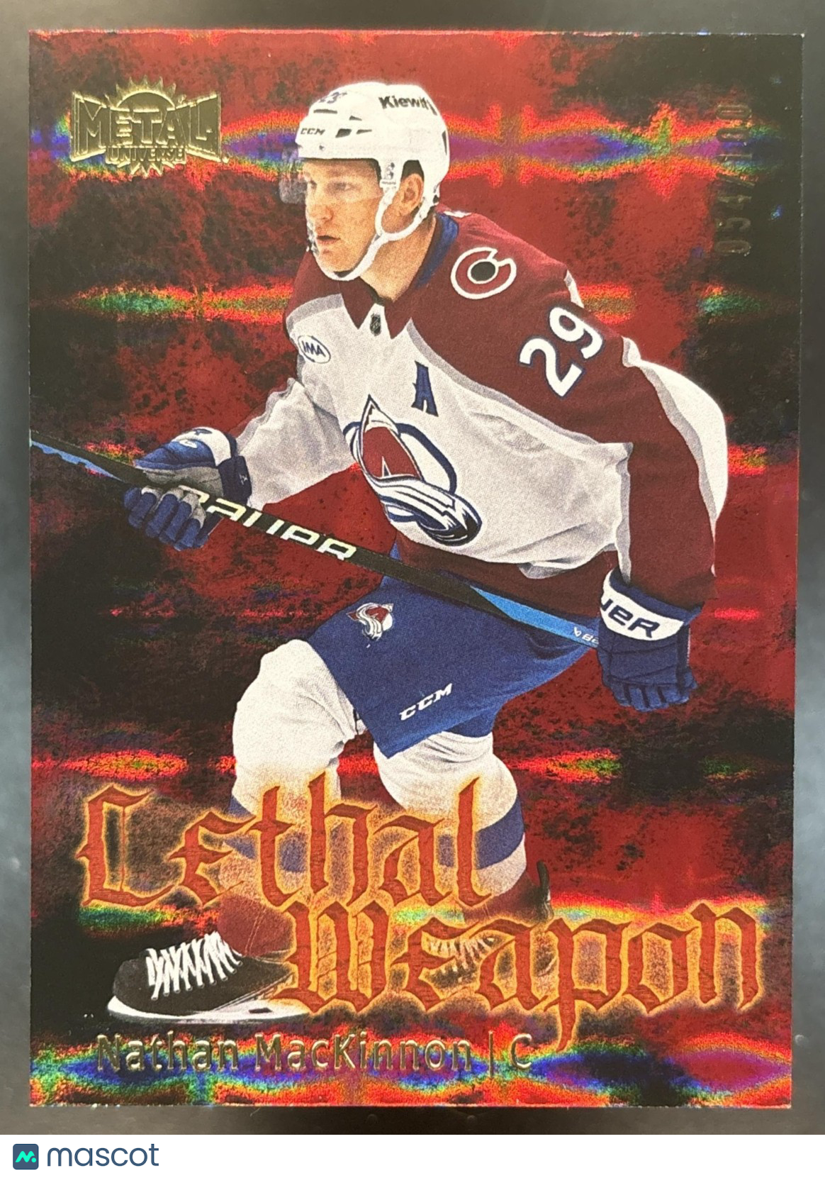 2025-26 Skybox Metal Universe Nathan MacKinnon Lethal Weapon Red /100 Avalanche