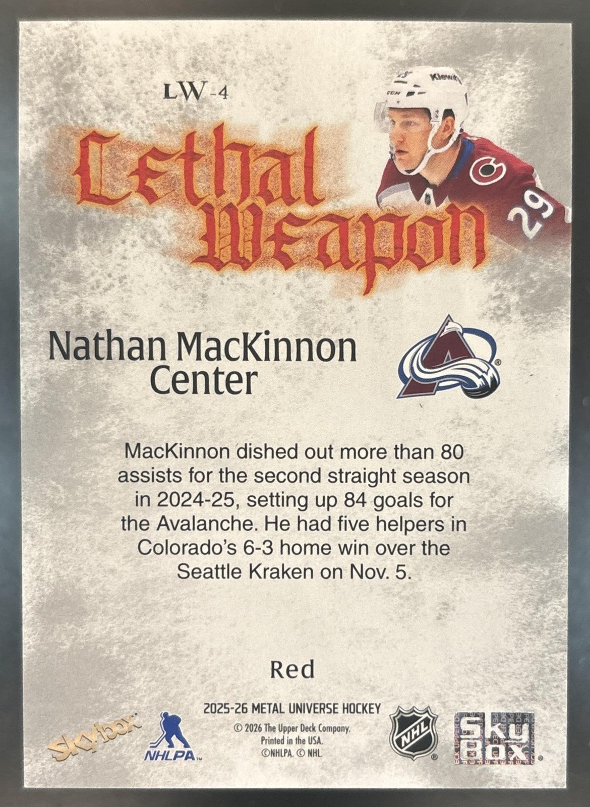 2025-26 Skybox Metal Universe Nathan MacKinnon Lethal Weapon Red /100 Avalanche